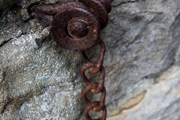 old rusty red bolt