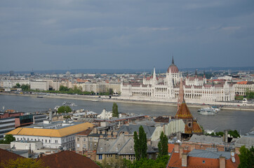 Fototapeta premium Budapest city skyline with the Hungarian Parliament and Danube River on a cloudy day, Budapest, Hungary