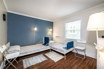 Beautiful renovated townhouse in a row with bathroom, bedrooms, new kitchen, new floors, all white painted, finished basement