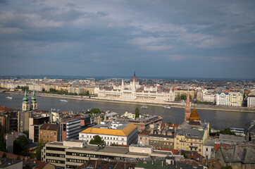 Fototapeta premium Budapest city skyline with the Hungarian Parliament and Danube River on a cloudy day, Budapest, Hungary