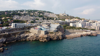 Aerial view of the Theatre of the Sea built on a rocky cliff over the Mediterranean Sea near Sete in the South of France - Ancien fort reused as a seaside cultural venue