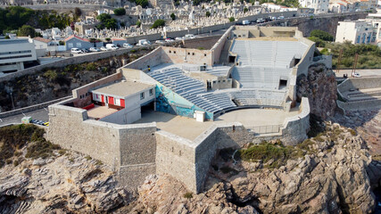 Aerial view of the Theatre of the Sea built on a rocky cliff over the Mediterranean Sea near Sete in the South of France - Ancien fort reused as a seaside cultural venue