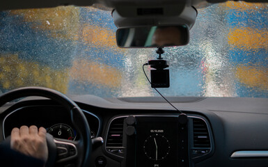 automatic car wash viewed from inside the car. Car sanitization concept