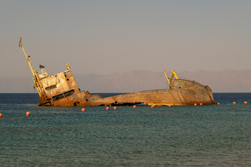 Sunset view of shipwreck in the Gulf of Aqaba off the Saudi Arabian coast, Haql Province