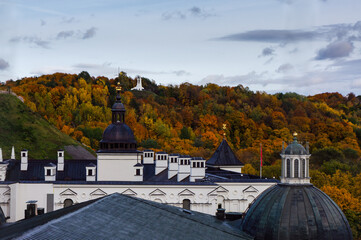 Vilnius city view of Three Crosses hill with colorful trees in autumn.