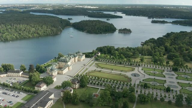 Drottningholm Castle, the royal palace of Sweden. Drone circle orbit view.