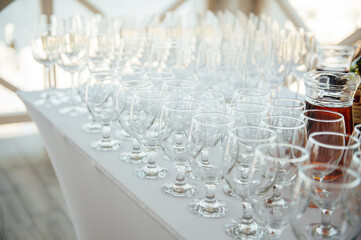 Glasses of champagne at the Banquet, white sparkling wine in wine glasses, festive mood