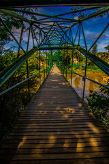 Fototapeta na wymiar Pedestrian bridge over Paraiba do sul river at the city of Guararema Sao Paulo 