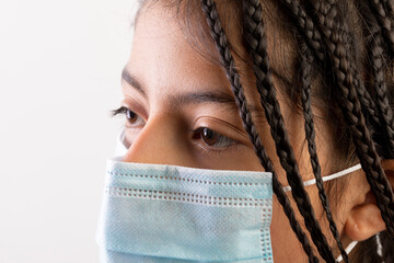  Girl using a protection mask