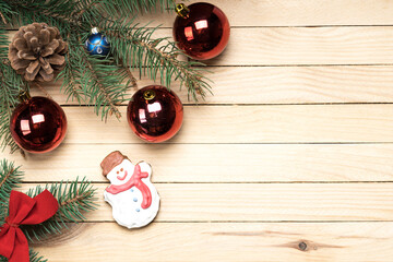 christmas decoration background. snowman cake on a wooden desk. above view. copy space