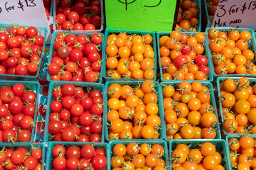 Red and Orange Tomatoes in $5 baskets, Farmers Market, Outdoors