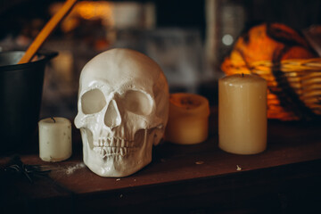 Scary halloween skull with candles in a spooky night. Halloween scene