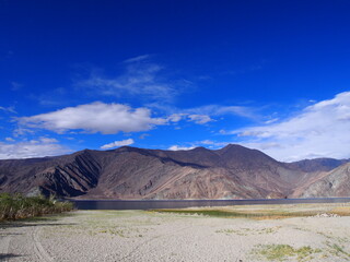 Panoramic view of beautiful lake and magnificent sky and mountains, Pangong tso (Lake), Durbuk, Leh, Ladakh, Jammu and Kashmir, India