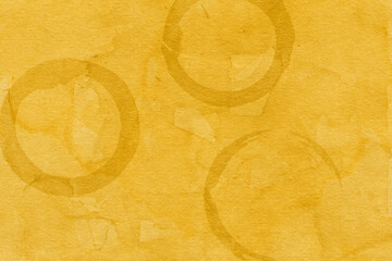 Vintage and old looking paper background. Colored gold with a brown retro book cover. Ancient book page.