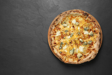 Tasty cheese pizza on dark table, top view. Space for text
