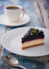 Cheesecake blueberry on wooden table
