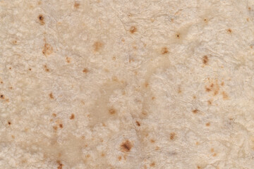 Tortilla mexican food texture in white background. Wrap texture