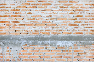 Construction brick wall with stain of cement texture for background