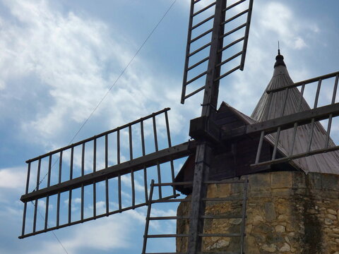 Wings of the beautiful Ribet mill known as the Daudet mill, this windmill of Provence is the most famous of the Fontvieille mills