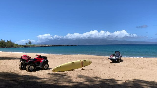 D. T. Fleming Beach in Maui, Hawaii with rescue craft on white sand 