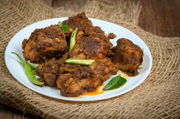 Kerala style spicy chicken roast or sukka