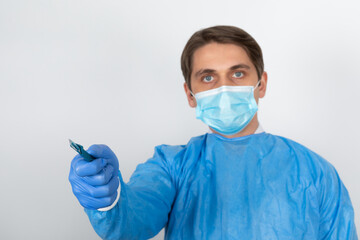 Young male doctor with scrubs