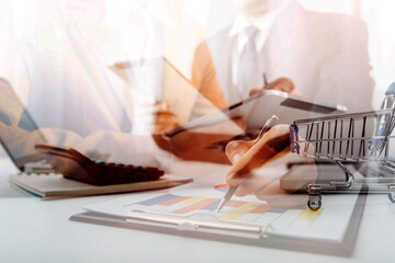 businesswoman hand using smart phone, tablet payments and holding credit card online shopping, omni channel, digital tablet docking keyboard computer at office in sun light