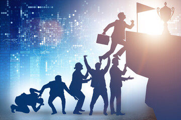 Career progression concept with businessman climbing stairs