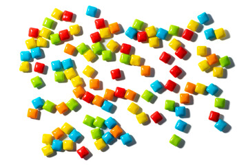 Candy. Colorful candies, dragee, chewing gum on a white isolated background top view frame copy space with a contrasting shadow. Advertising label design element. Full depth of field.