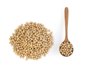 Soy beans in wooden spoon isolated on white backgroun, health care concept