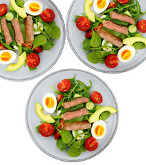 Healthy salad with beef cherry tomatoes and boiled egg.
