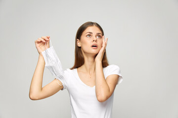 woman looking up medical mask in hand protection 