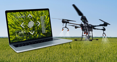 Drone sprayer and laptop. Smart farm