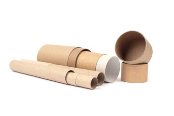 Set of different recyclable paper tubes with paper caps, cardboard container for packaging isolated on white background with copyspace. Recyclable packaging or zero waste concept, mockup