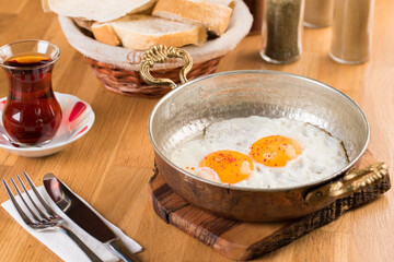 Traditional Turkish Breakfast - Fried Egg, Bread and Tea