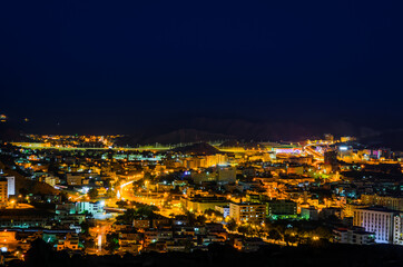 Illuminated cityscape of Muscat, Oman. Long Exposure Photography.