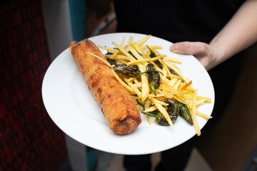 flamenquin XXL con patatas paja