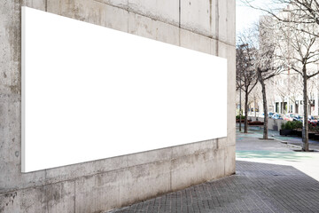 Blank billboard on the wall of building