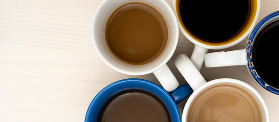 Many cups of coffee on table flat lay copy space.