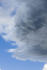 Dramatic panoramic skyscape with dark stormy clouds
