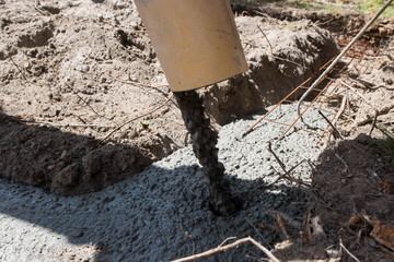 truck delivering concrete to the construction site