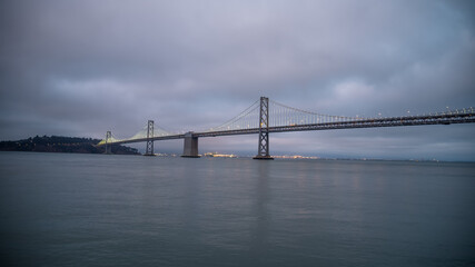 Panoramic view of San Francisco Bay bridge during evening, California, United States