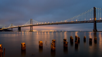 Panoramic view of San Francisco Bay bridge at night, California, United States