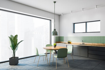 White and green dining room corner