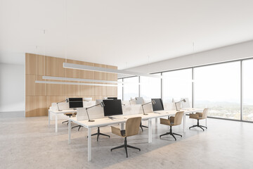 Fototapeta na wymiar Modern white and wooden open space office corner