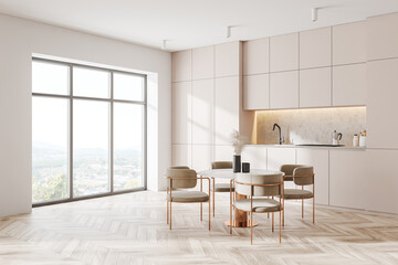 Modern white and gray kitchen corner with dining table