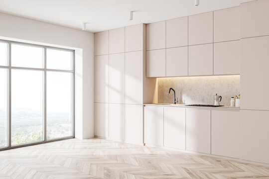 Minimalistic white kitchen corner with cabinets