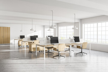 Stylish white open space office corner with wooden tables