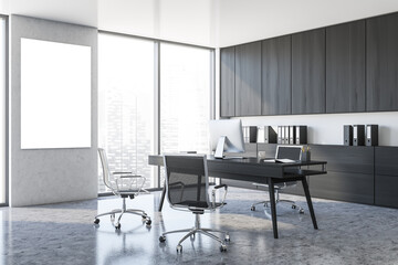 Modern white CEO office with wooden cabinets and poster