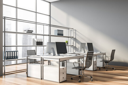 Modern gray open space office corner
